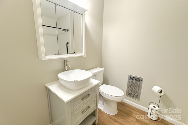 123 Avondale Ridge Rd, Asheville, NC 28803 - bathroom with vanity and wood finished floors