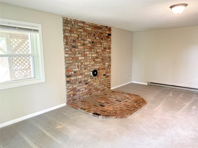 123 Avondale Ridge Rd, Asheville, NC 28803 - carpeted spare room with a baseboard radiator and a textured ceiling