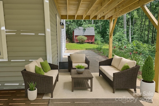 123 Avondale Ridge Rd, Asheville, NC 28803 - view of patio with an outdoor living space and a shed