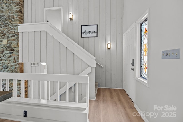 4208 Burning Tree Dr, Charlotte, NC 28277 - staircase featuring wood finished floors and wooden walls