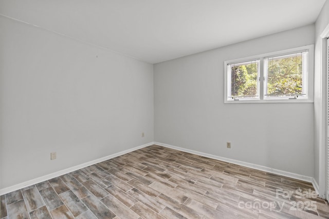 4208 Burning Tree Dr, Charlotte, NC 28277 - empty room with wood finished floors and baseboards
