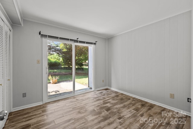 4208 Burning Tree Dr, Charlotte, NC 28277 - unfurnished room featuring wood finished floors and crown molding