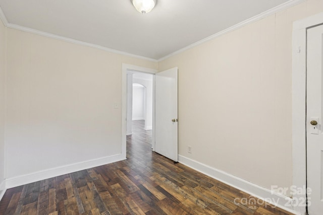 603 Paradise St, Monroe, NC 28112 - spare room featuring crown molding and dark wood-style floors