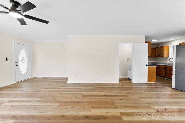 400 N Main Gq St, Granite Quarry, NC 28146 - unfurnished living room with ornamental molding, a ceiling fan, light wood-type flooring, and recessed lighting
