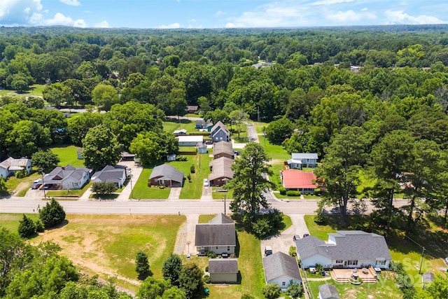 400 N Main Gq St, Granite Quarry, NC 28146 - aerial perspective of suburban area featuring a forest