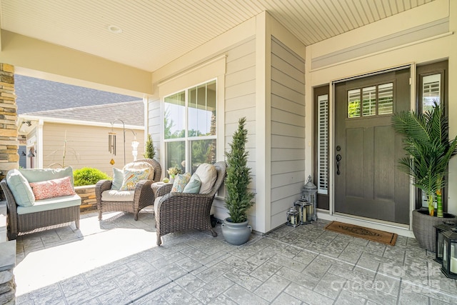 3899 Zemosa Ln NW, Concord, NC 28027 - entrance to property with outdoor lounge area