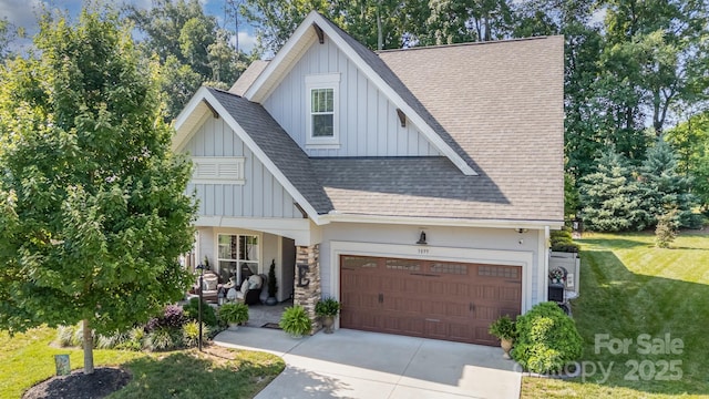3899 Zemosa Ln NW, Concord, NC 28027 - view of front of home with board and batten siding, roof with shingles, a front yard, driveway, and a garage