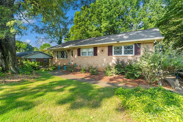 6632 Candlewood Dr, Charlotte, NC 28210 - view of front of house featuring a front yard and brick siding