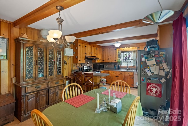 6632 Candlewood Dr, Charlotte, NC 28210 - dining room featuring beam ceiling, light tile patterned flooring, and wooden walls