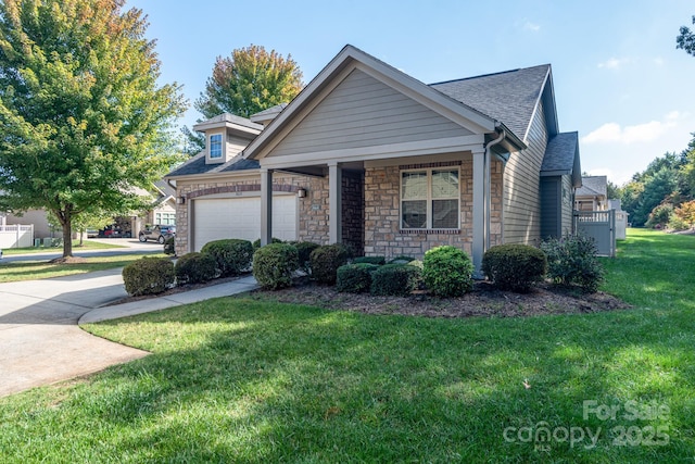 860 Wynnshire Dr, Hickory, NC 28601 - view of front of house with an attached garage, a front lawn, roof with shingles, stone siding, and concrete driveway