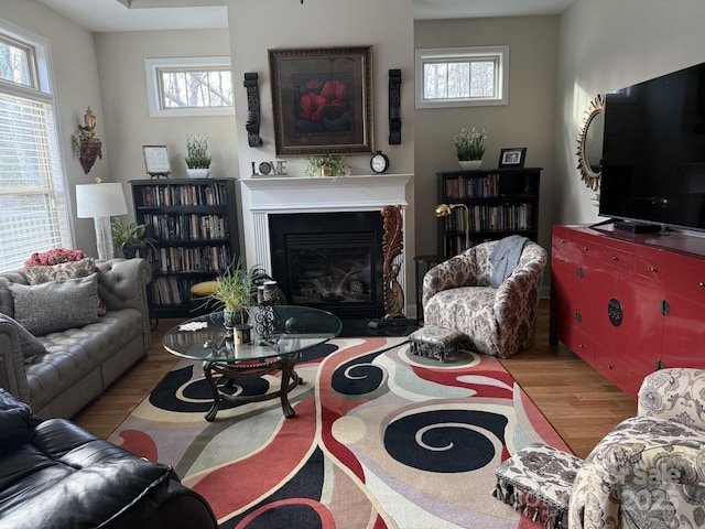 860 Wynnshire Dr, Hickory, NC 28601 - living area with wood finished floors and a fireplace with flush hearth