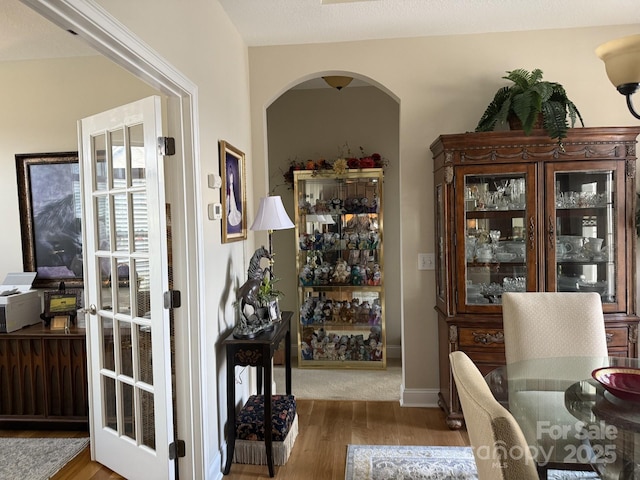 860 Wynnshire Dr, Hickory, NC 28601 - dining space featuring arched walkways and wood finished floors