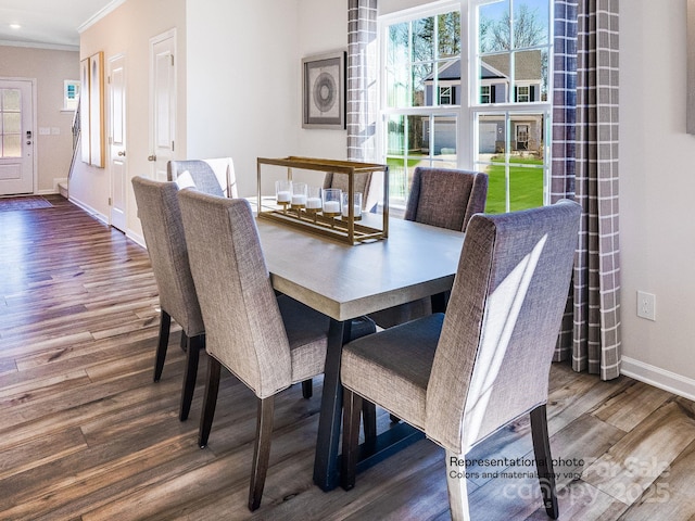 1016 Lookout Shoals Dr, Fort Mill, SC 29715 - dining area featuring wood finished floors and ornamental molding