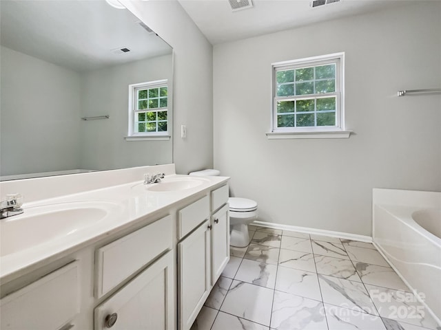 8701 Holly Creek Ct, Charlotte, NC 28216 - full bath featuring marble look tiles, a bath, and double vanity
