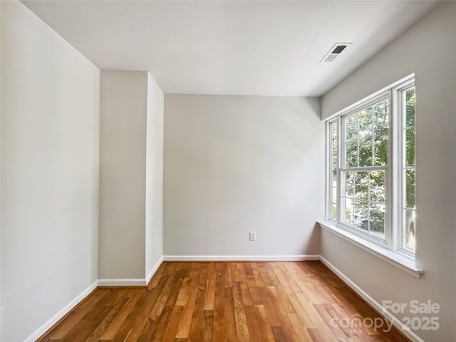 8701 Holly Creek Ct, Charlotte, NC 28216 - empty room with wood finished floors and baseboards