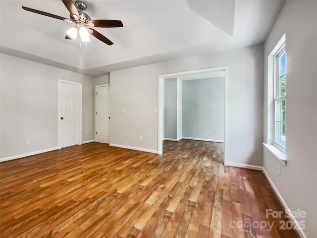 8701 Holly Creek Ct, Charlotte, NC 28216 - empty room featuring light wood-style flooring and ceiling fan