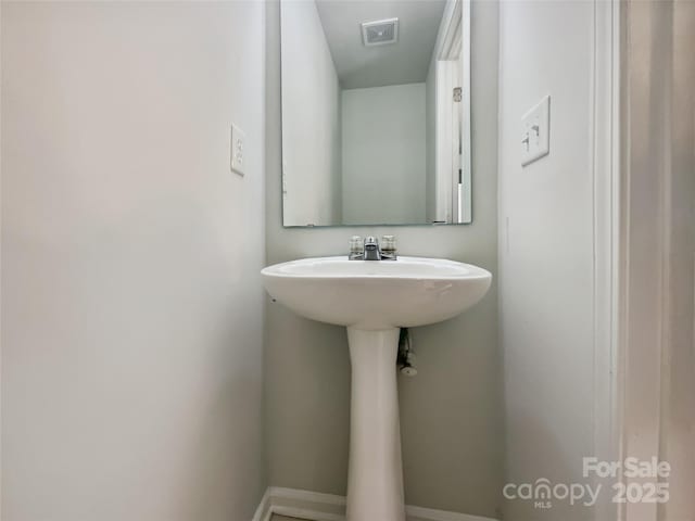 8701 Holly Creek Ct, Charlotte, NC 28216 - bathroom featuring a sink