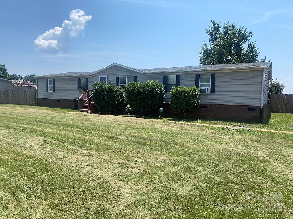 1064 Calico Farm Ct, Cleveland, NC 27013 - manufactured / mobile home featuring crawl space and cooling unit