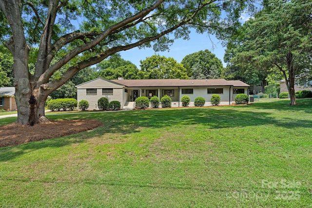4209 Windwood Cir, Charlotte, NC 28226 - ranch-style house featuring a front lawn