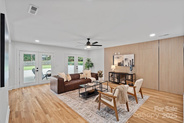 4209 Windwood Cir, Charlotte, NC 28226 - living room featuring french doors, light wood-style floors, a ceiling fan, and recessed lighting