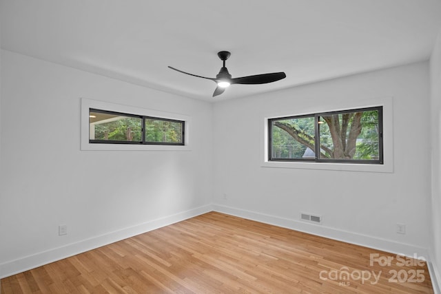 4209 Windwood Cir, Charlotte, NC 28226 - spare room featuring light wood-type flooring and ceiling fan