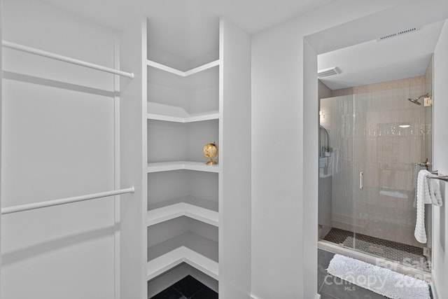 4209 Windwood Cir, Charlotte, NC 28226 - walk in closet with tile patterned flooring