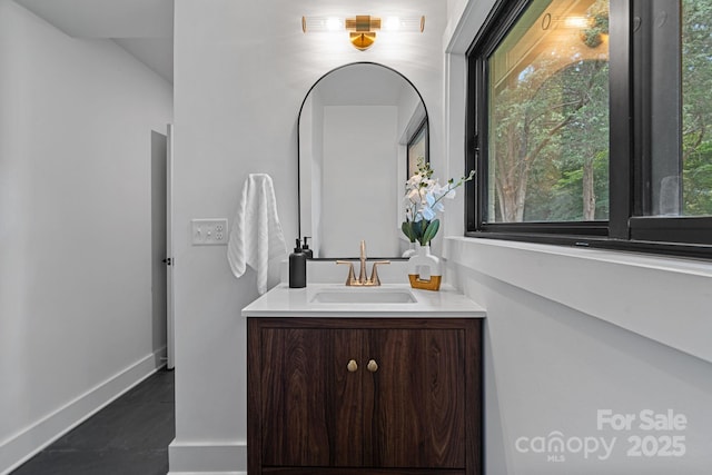 4209 Windwood Cir, Charlotte, NC 28226 - bathroom with vanity, tile patterned flooring, and healthy amount of natural light
