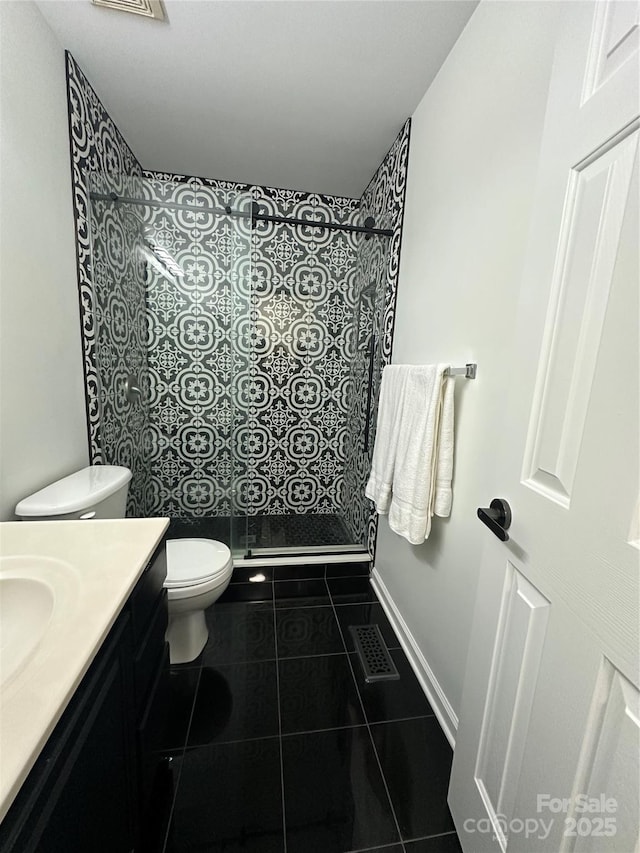 215 Linkside Ct SE, Lenoir, NC 28645 - full bath featuring vanity, a stall shower, and tile patterned flooring