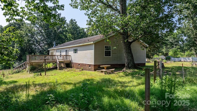 6314 Providence Church Rd, Vale, NC 28168 - rear view of house with stairs, a wooden deck, and crawl space