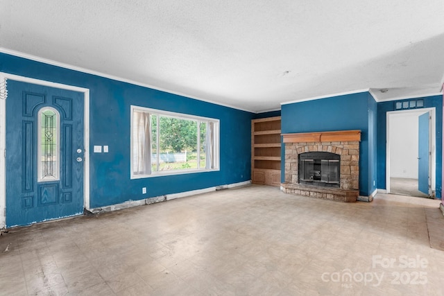 6314 Providence Church Rd, Vale, NC 28168 - unfurnished living room with a textured ceiling, crown molding, tile patterned floors, and a stone fireplace