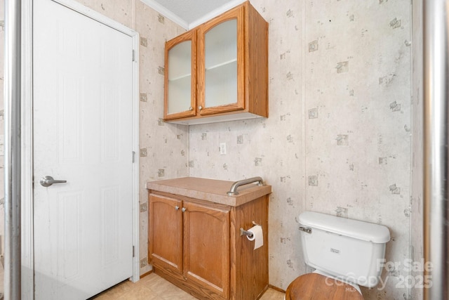6314 Providence Church Rd, Vale, NC 28168 - bathroom with wallpapered walls and ornamental molding