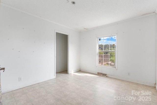 6314 Providence Church Rd, Vale, NC 28168 - unfurnished room featuring crown molding and tile patterned floors