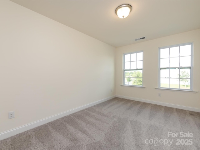 1206 Pebble Grove Dr, Clover, SC 29710 - spare room with baseboards and light carpet