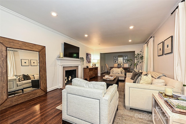 5301 Addison Dr, Charlotte, NC 28211 - living room with dark wood-style flooring, crown molding, recessed lighting, and a fireplace