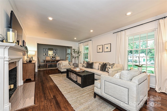 5301 Addison Dr, Charlotte, NC 28211 - living room featuring crown molding, wood finished floors, recessed lighting, and a fireplace with flush hearth