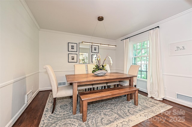 5301 Addison Dr, Charlotte, NC 28211 - dining space featuring crown molding and dark wood-type flooring
