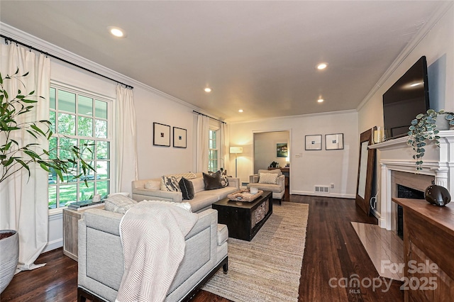 5301 Addison Dr, Charlotte, NC 28211 - living room with ornamental molding, dark wood-type flooring, healthy amount of natural light, recessed lighting, and a high end fireplace