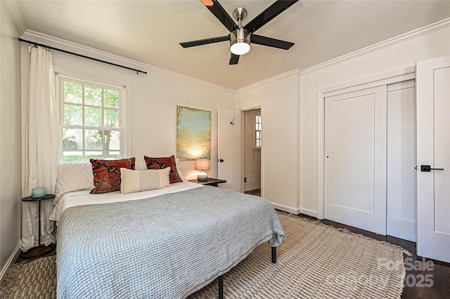 5301 Addison Dr, Charlotte, NC 28211 - bedroom featuring ornamental molding, a closet, and ceiling fan