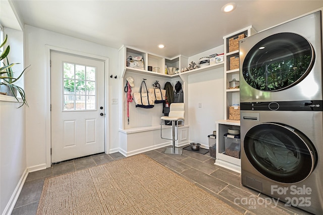 5301 Addison Dr, Charlotte, NC 28211 - laundry room with stacked washer and clothes dryer and recessed lighting