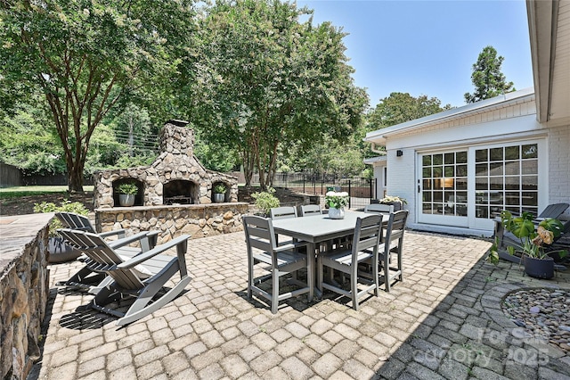5301 Addison Dr, Charlotte, NC 28211 - view of patio / terrace with an outdoor stone fireplace and outdoor dining area