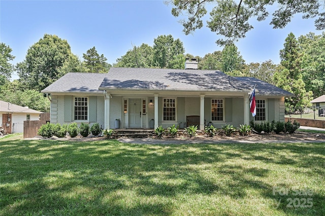 5301 Addison Dr, Charlotte, NC 28211 - ranch-style home with brick siding, a chimney, covered porch, and roof with shingles