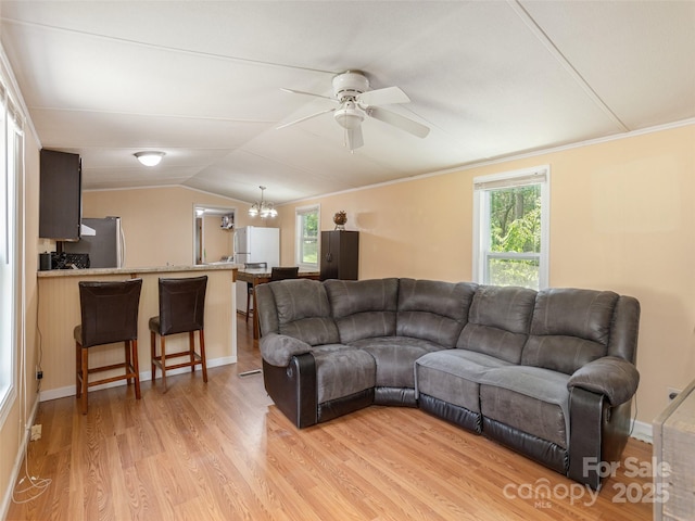 5 Shenandoah Rd, Asheville, NC 28805 - living room with light wood-style flooring, a chandelier, a ceiling fan, and vaulted ceiling