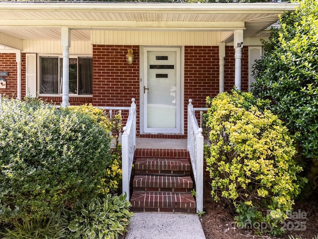 331 Elwood St, Kannapolis, NC 28081 - property entrance with brick siding and covered porch