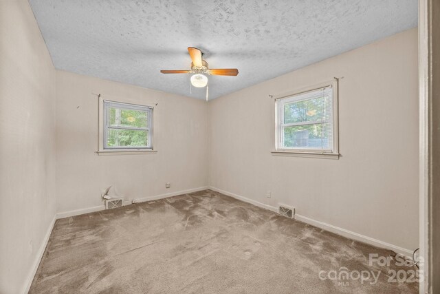 331 Elwood St, Kannapolis, NC 28081 - carpeted spare room featuring ceiling fan and a textured ceiling