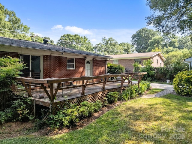331 Elwood St, Kannapolis, NC 28081 - back of house featuring brick siding, a wooden deck, and a shingled roof