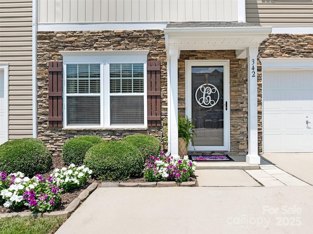 342 Battery Cir, Clover, SC 29710 - doorway to property featuring stone siding and driveway