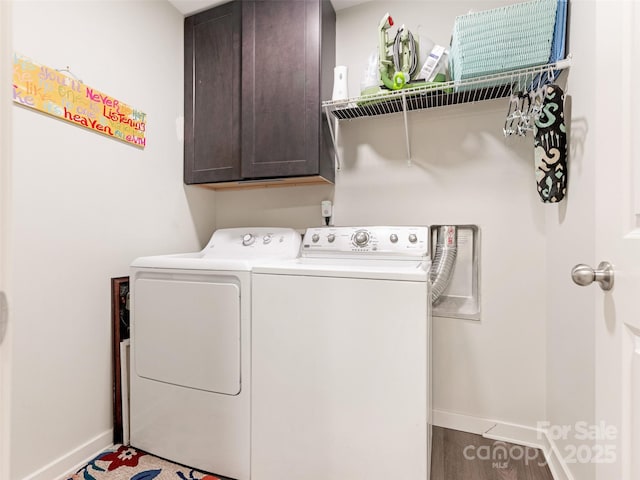 342 Battery Cir, Clover, SC 29710 - laundry room with washer and dryer, cabinet space, and wood finished floors