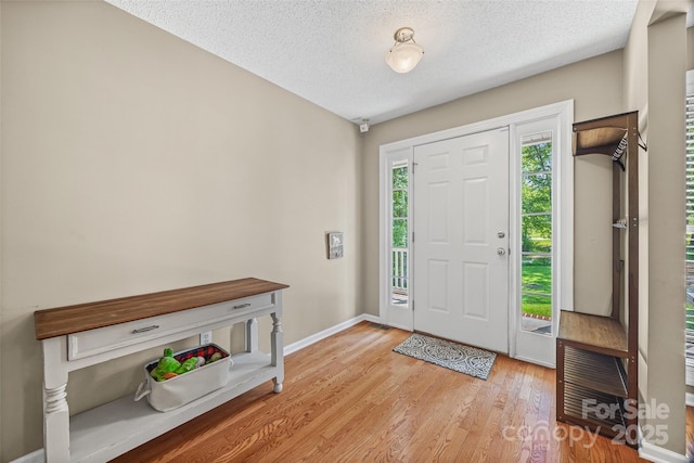 1921 Williford Woods Ln, Rock Hill, SC 29730 - foyer featuring a textured ceiling and light wood finished floors