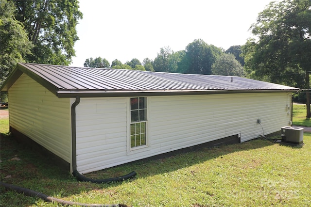 127 Setzer St, Spindale, NC 28160 - view of property exterior featuring a lawn and a metal roof