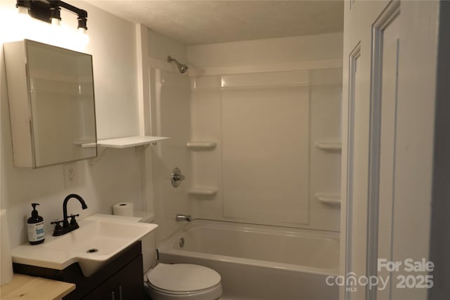 127 Setzer St, Spindale, NC 28160 - bathroom with vanity, bathtub / shower combination, and a textured ceiling